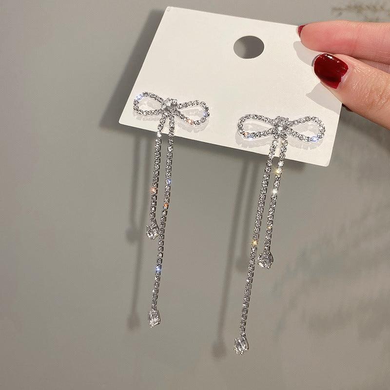 Long Bow Tie Stud Earrings | Party Wear