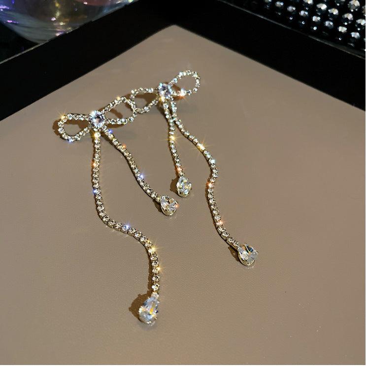 Long Bow Tie Stud Earrings | Party Wear